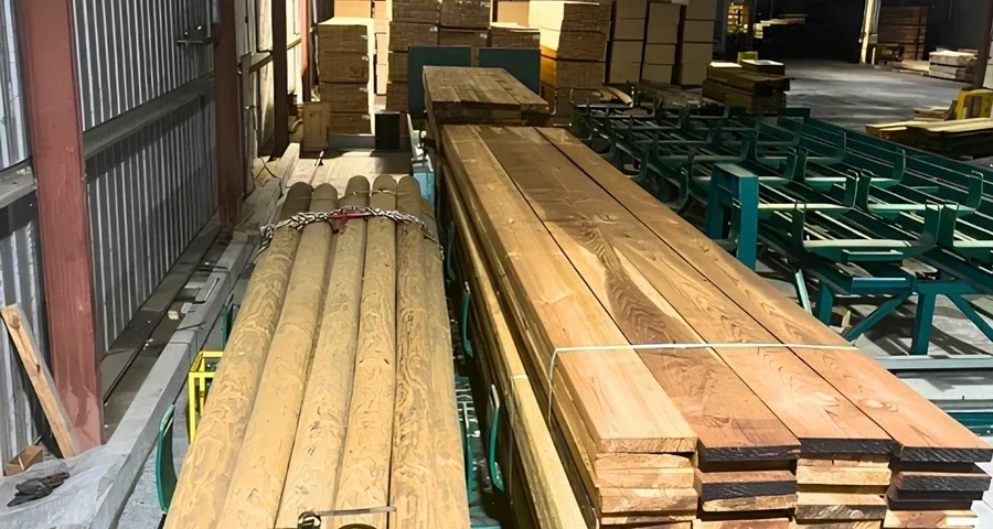 Industrial roundwood production at a wood treatment facility