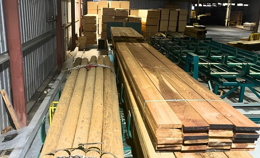 Industrial roundwood production at a wood treatment facility